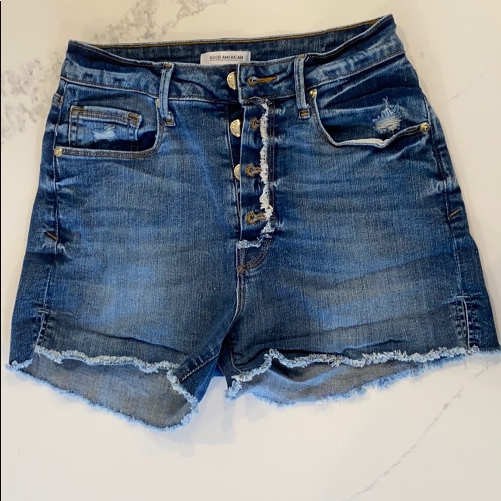Good American raw hem denim shorts
